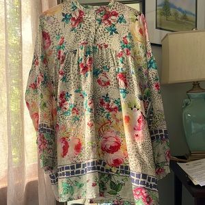 Beautiful silk blouse. Multi-colored. Sized extra small but fits to medium